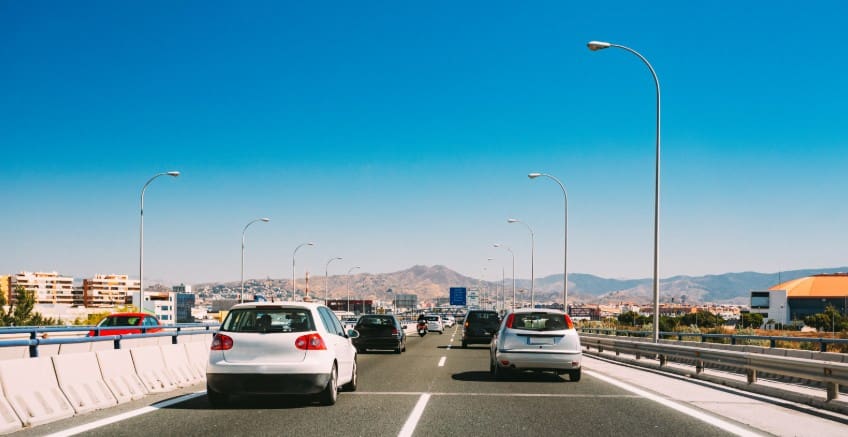 Photo illustrates the large number of cars on the highway during the holiday season.