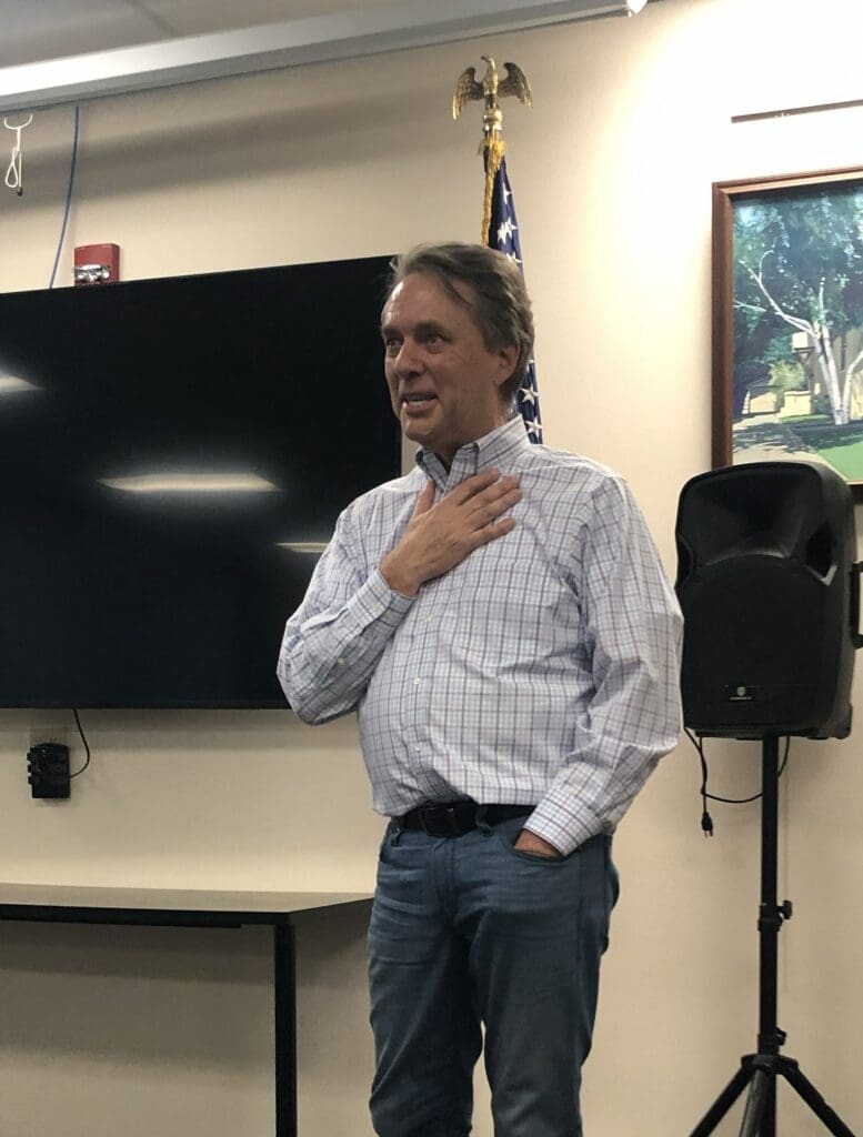 Jeff Colyer, candidate for Kansas governor, visits with a group in Clay Center, Kansas.